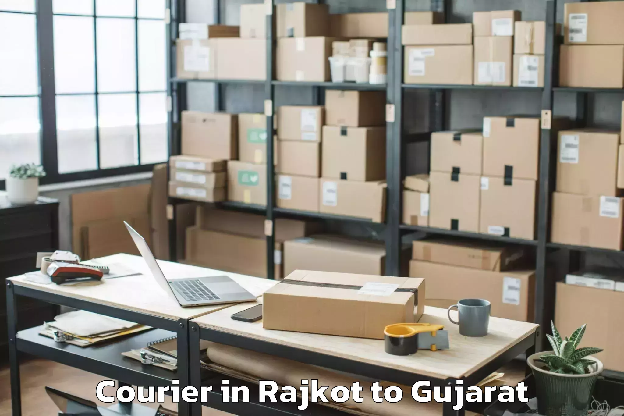 Easy Rajkot to Itm Vocational University Wagh Courier Booking